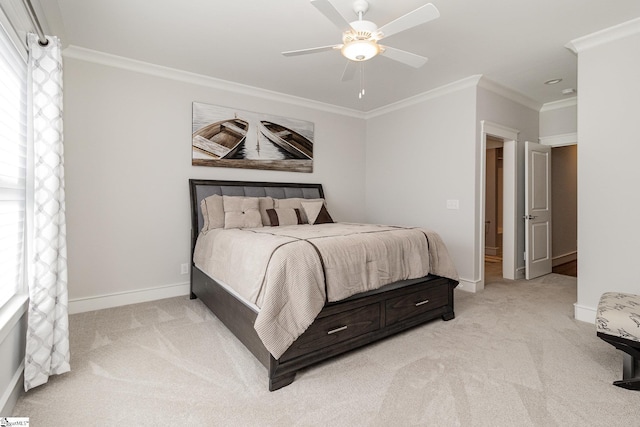 bedroom featuring baseboards, ceiling fan, ornamental molding, and light colored carpet