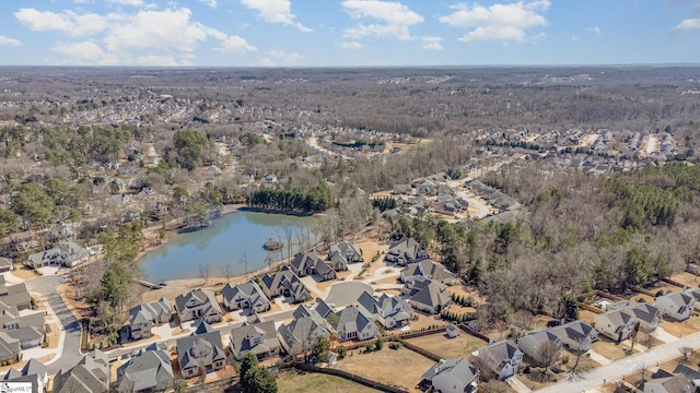 bird's eye view with a residential view and a water view