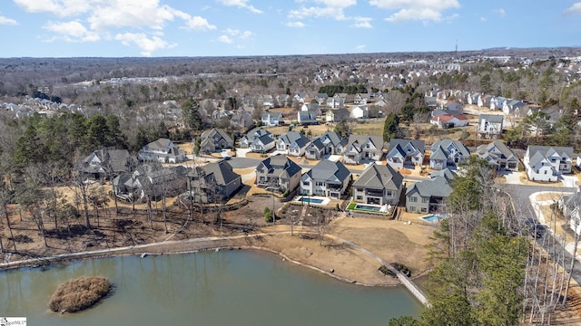 bird's eye view with a water view and a residential view