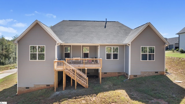 back of house with crawl space, stairs, a deck, and roof with shingles