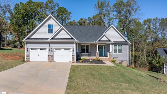 craftsman-style home with driveway, metal roof, crawl space, a standing seam roof, and a front yard