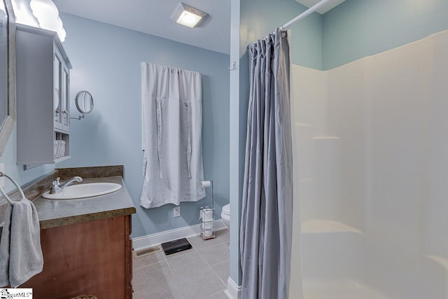 full bathroom featuring curtained shower, visible vents, toilet, vanity, and tile patterned flooring