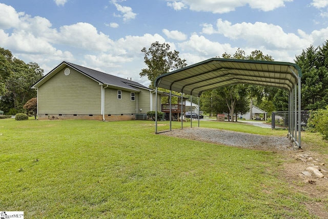 exterior space with driveway and a carport