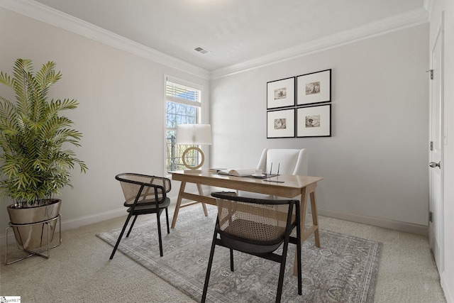 office area with visible vents, crown molding, and baseboards