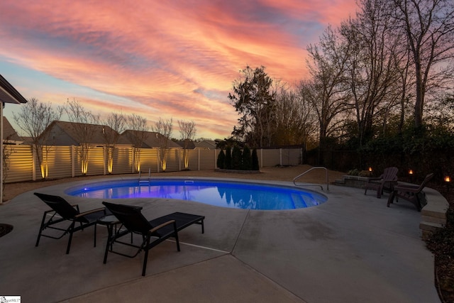 view of swimming pool with a patio, a fenced backyard, and a fenced in pool