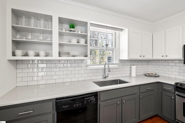 kitchen featuring black dishwasher, crown molding, gray cabinets, and a sink