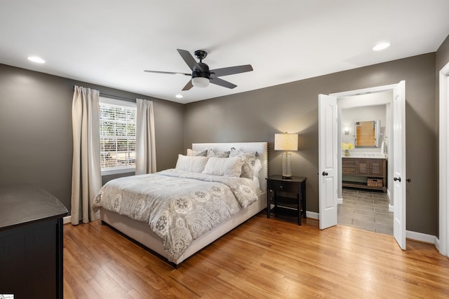 bedroom featuring a ceiling fan, light wood-type flooring, baseboards, and recessed lighting