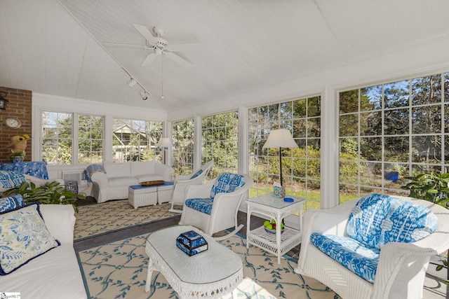 sunroom with a ceiling fan