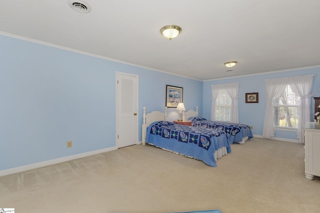 carpeted bedroom with crown molding, visible vents, and baseboards