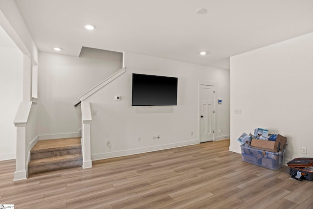 108 Marston Ln, Greenville, SC 29617 - living room with light wood-style floors, baseboards, stairway, and recessed lighting