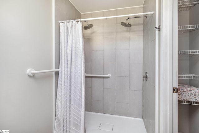 bathroom featuring a stall shower