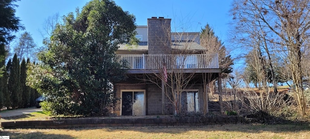 144 Amber Dr, Inman, SC 29349 - back of house featuring a deck and a chimney