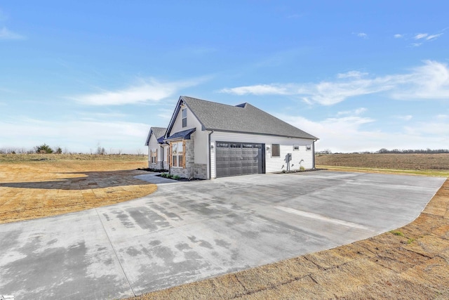 794 Hebron Church Rd, Iva, SC 29655 - view of property exterior with driveway, stone siding, and an attached garage