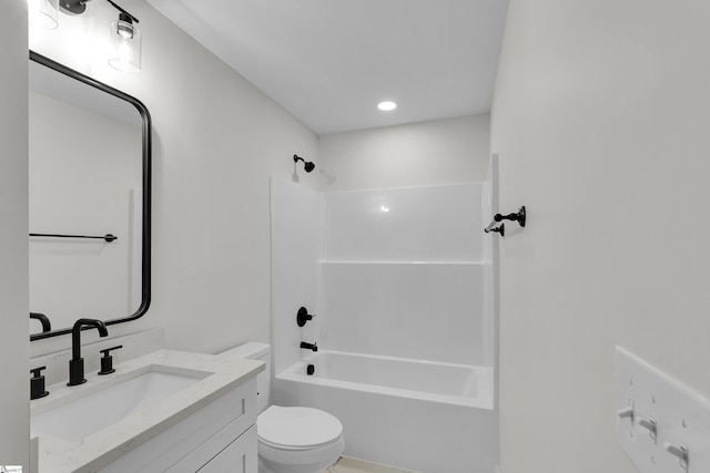 bathroom featuring shower / tub combination, vanity, and toilet