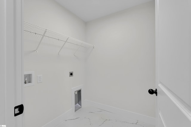 washroom with hookup for an electric dryer, laundry area, washer hookup, baseboards, and marble finish floor