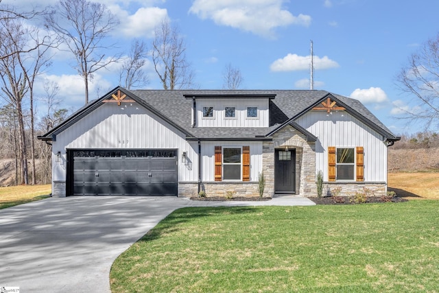 modern inspired farmhouse with an attached garage, stone siding, a front yard, and driveway