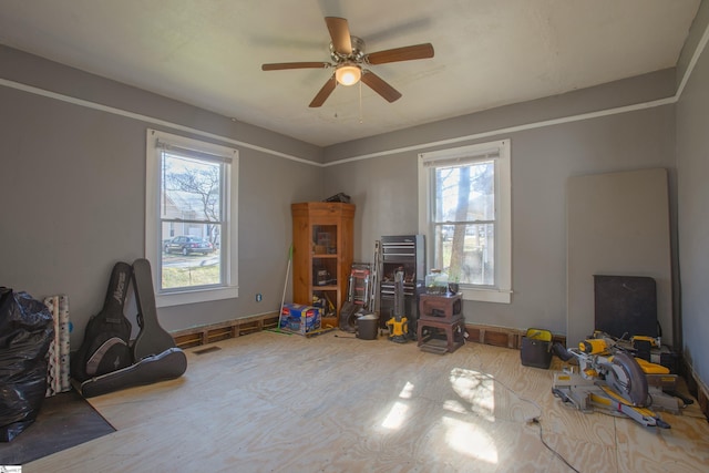 rec room with ceiling fan