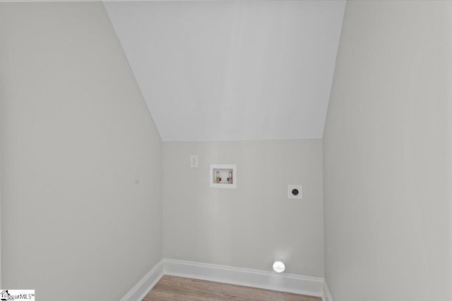 laundry room with hookup for a washing machine, hookup for an electric dryer, laundry area, wood finished floors, and baseboards