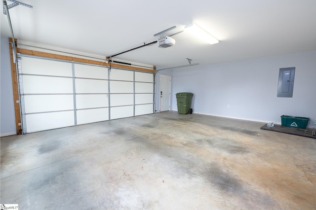 garage featuring electric panel, baseboards, and a garage door opener