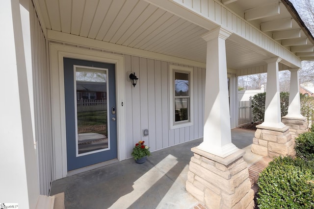 doorway to property featuring a porch