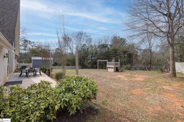 view of yard with a patio area and a fenced backyard