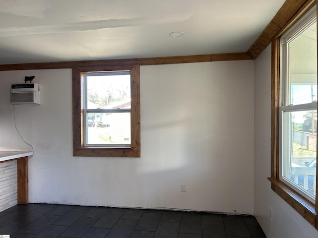 spare room featuring a wall mounted AC