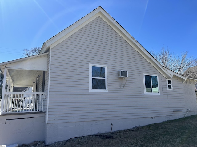 view of side of home with crawl space