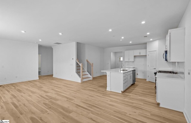 120 Indigo Cir Lot 35, Easley, SC 29642 - kitchen with a sink, open floor plan, stainless steel appliances, recessed lighting, and white cabinetry