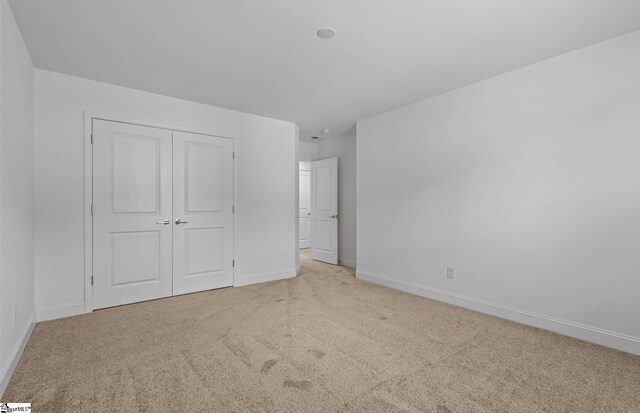 120 Indigo Cir Lot 35, Easley, SC 29642 - unfurnished bedroom with carpet floors, baseboards, and a closet