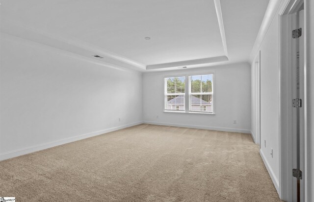 120 Indigo Cir Lot 35, Easley, SC 29642 - empty room with a raised ceiling, light colored carpet, and baseboards