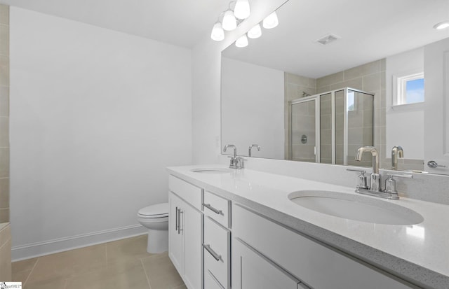 120 Indigo Cir Lot 35, Easley, SC 29642 - bathroom featuring a stall shower, tile patterned flooring, toilet, double vanity, and baseboards