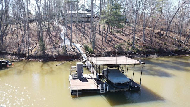 view of dock with a water view