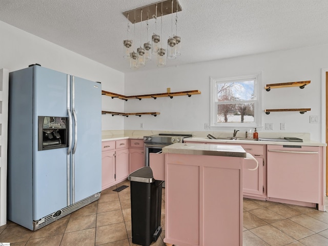 kitchen with open shelves, white appliances, light tile patterned flooring, and a sink