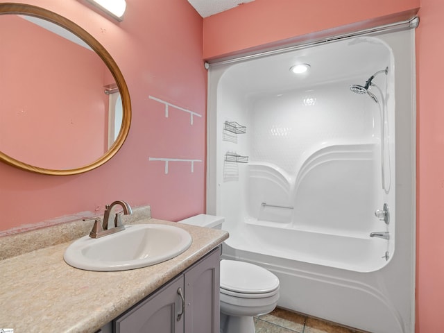 bathroom with toilet, shower / bathtub combination, and vanity