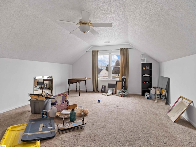 bonus room with lofted ceiling, carpet floors, visible vents, and baseboards