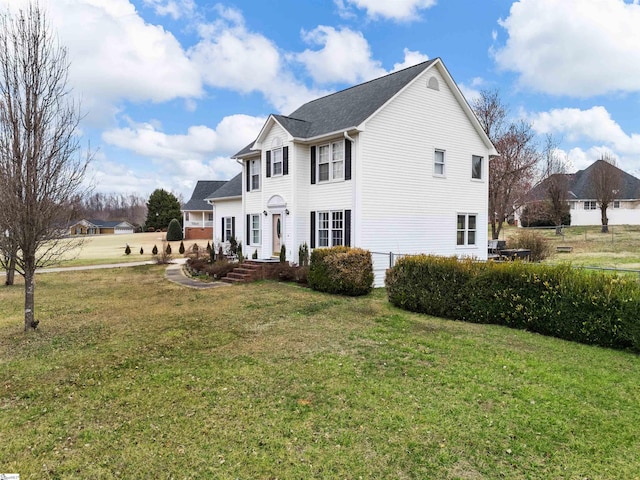 exterior space featuring a front lawn