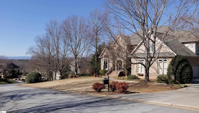 view of road featuring curbs