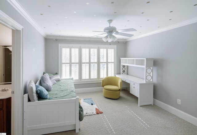 bedroom with baseboards, ornamental molding, ceiling fan, and light colored carpet