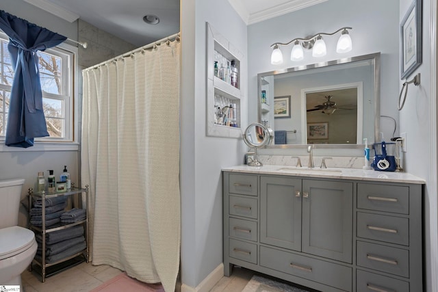 bathroom with toilet, a ceiling fan, vanity, baseboards, and ornamental molding