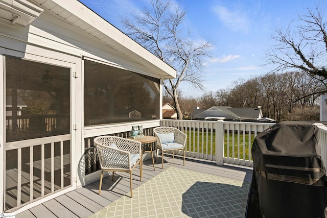 wooden terrace with grilling area