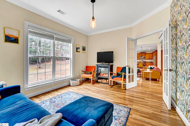 621 Shefwood Dr, Easley, SC 29642 - living room featuring french doors, crown molding, visible vents, light wood-style flooring, and baseboards