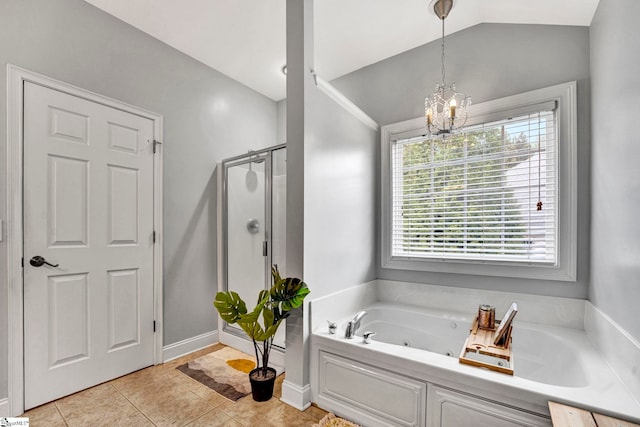 621 Shefwood Dr, Easley, SC 29642 - full bath featuring a chandelier, lofted ceiling, tile patterned flooring, a shower stall, and a whirlpool tub