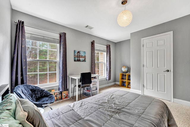 621 Shefwood Dr, Easley, SC 29642 - carpeted bedroom featuring visible vents, baseboards, and multiple windows