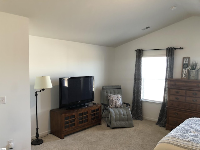 bedroom with vaulted ceiling, carpet, visible vents, and baseboards