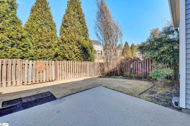 view of patio / terrace featuring fence