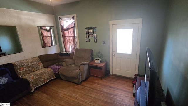 living room with wood finished floors