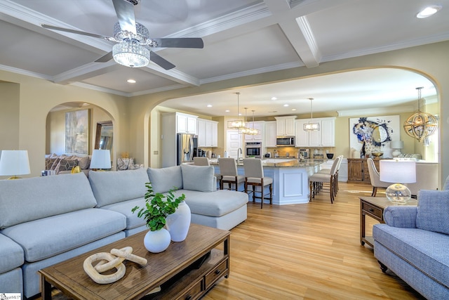 living room with light wood-type flooring, beam ceiling, coffered ceiling, and recessed lighting