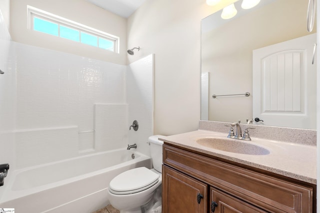 bathroom with toilet, shower / bathtub combination, and vanity