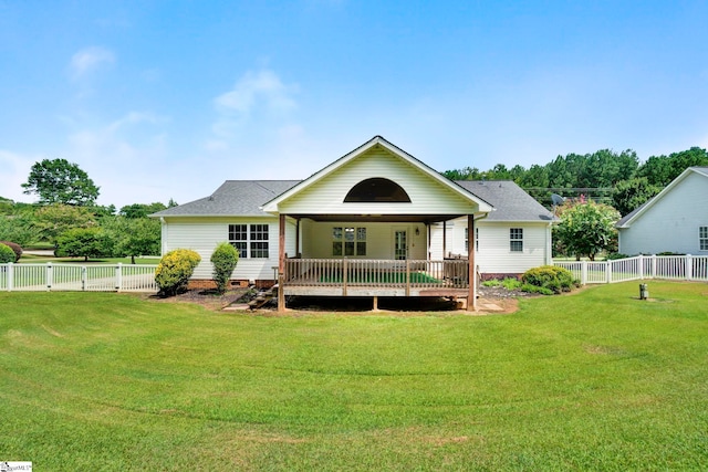 back of property featuring crawl space, a fenced backyard, and a yard