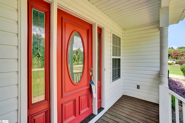 entrance to property with a porch